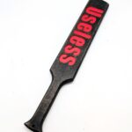 "Useless" long black paddle